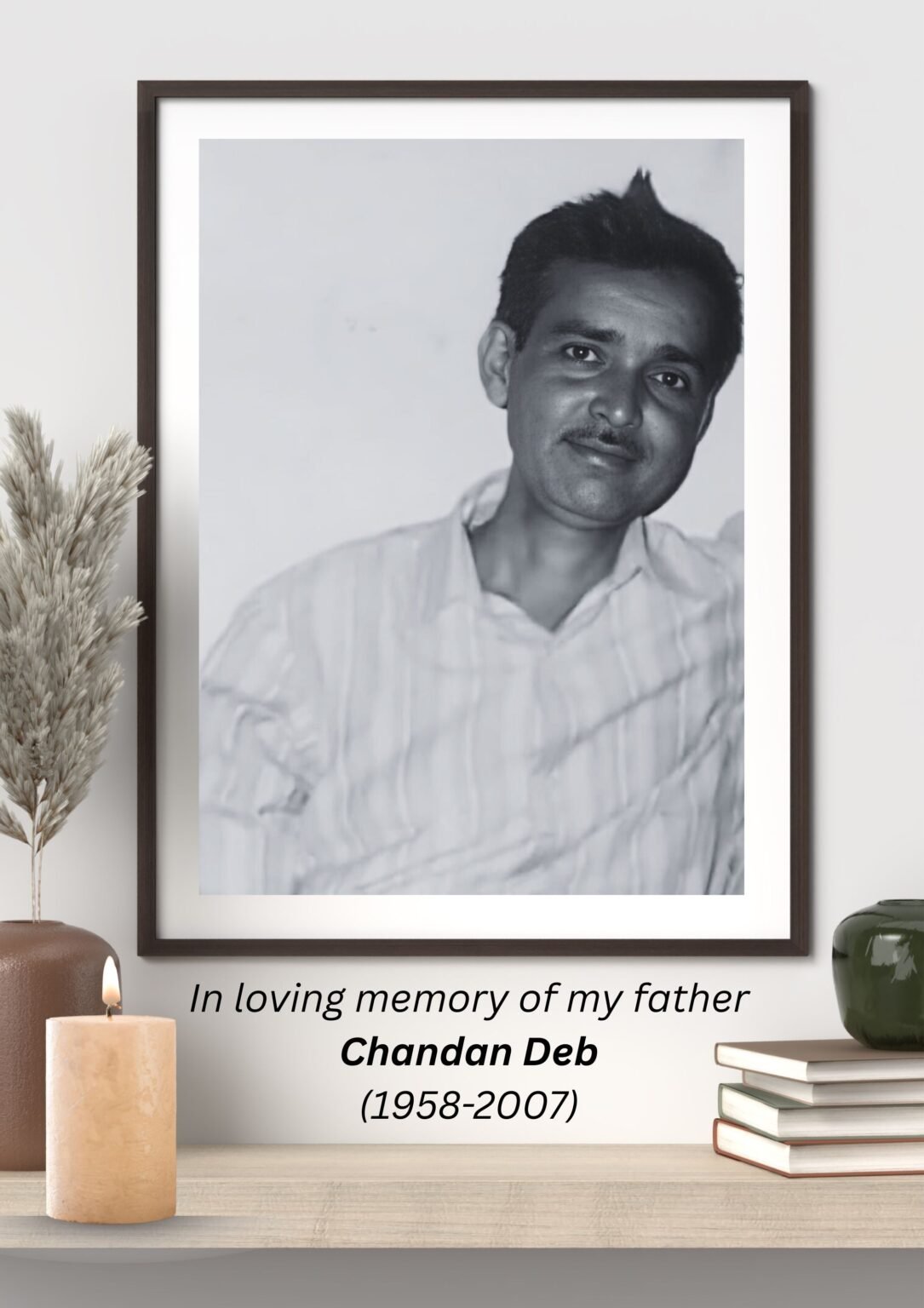 Framed portrait of Chandan Deb (1958–2007), with the words: In loving memory of my father
